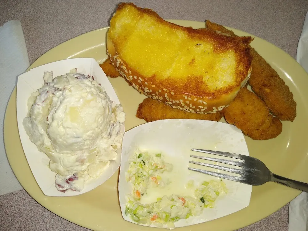 Chicken Tenders Loaded Potato Salad Cole Slaw and Barbecue Bread